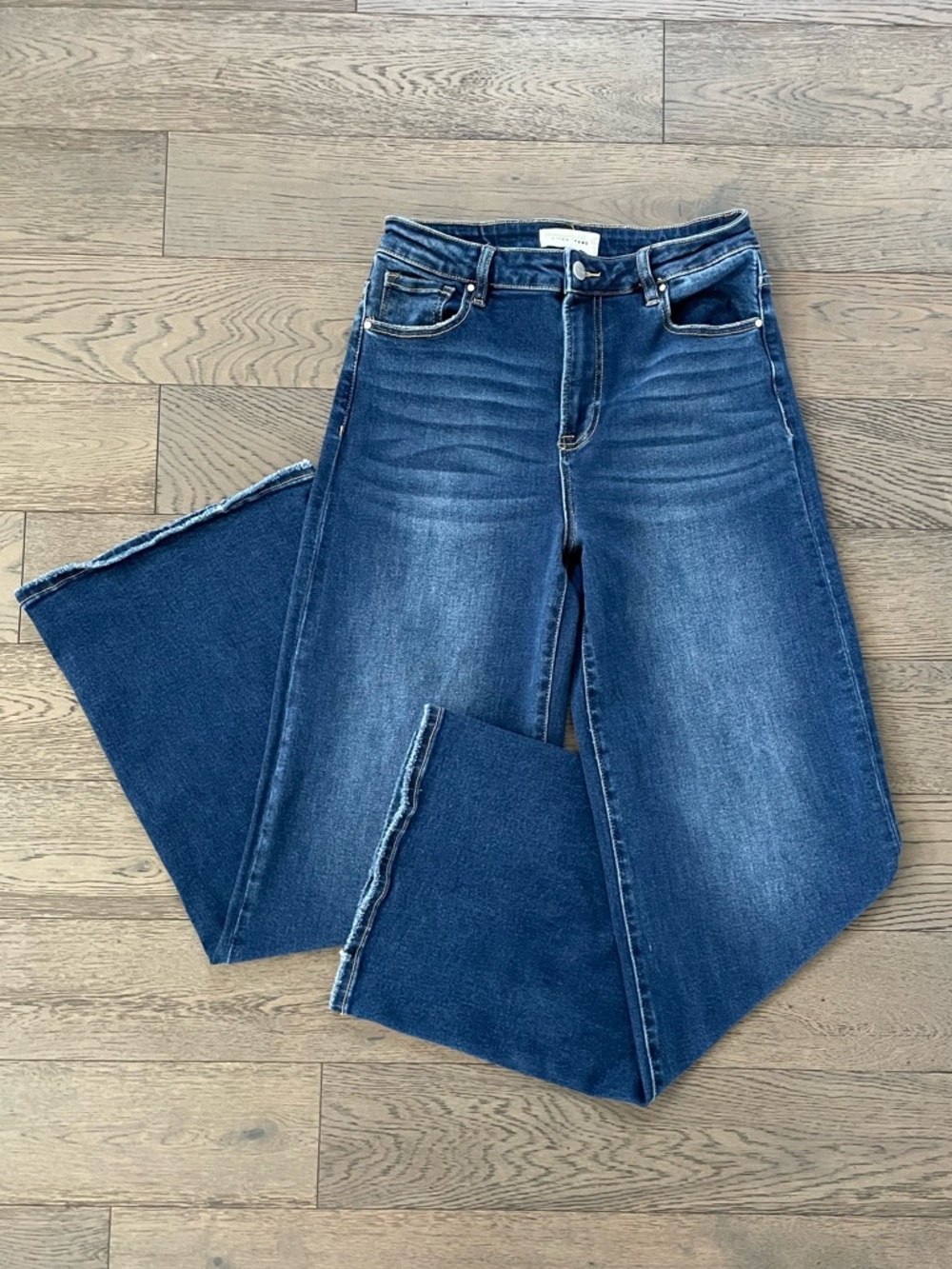 Risen High Rise Wide Leg Jeans